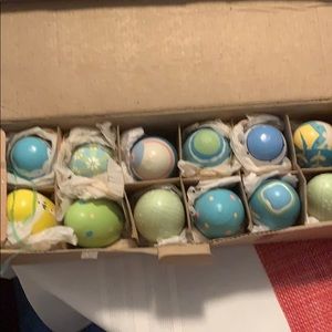 A dozen wooden Easter eggs